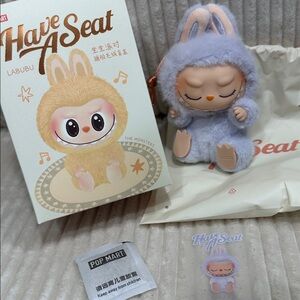 ZIZI- Pop Mart Labubu Have A Seat Figure - New. Box opened to verify. Purple.